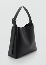 Bolso de forma estructurada en color beige, con asa superior y diseño minimalista.