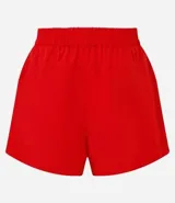 Short deportivo femenino modelo runner, color marrón chocolate con cintura elástica y rayas laterales color crema.