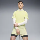 Remera deportiva Puma Run Velocity color amarillo con logo estampado en el pecho.