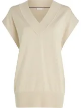 Túnica color beige de punto con cuello en V y sisas amplias.