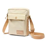 Bolso bandolera compacto Columbia Zigzag II, color beige con detalles en marrón claro. Cuenta con un compartimento principal, un bolsillo exterior de seguridad y una correa ajustable.