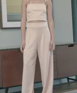 Pantalón palazzo color rosa pálido, de crepé elastizado.