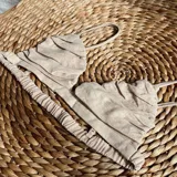 Top color beige con breteles finos y fruncido en el busto.
