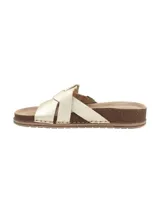 Sandalias bajas doradas con tiras cruzadas y plantilla de corcho.