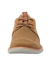 Zapato híbrido de hombre color marrón, con capellada de tejido ligero y detalles en cuero. Suela con tecnología Honey Foam.