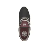 Zapatillas Etnies Jameson 2 Eco, color negro con detalles en marrón en el talón y la lengüeta.