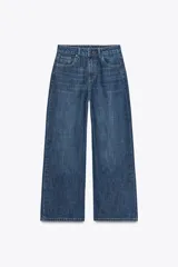 Pantalón de jean azul de corte ancho, tiro alto y efecto lavado.