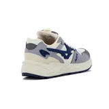 Championes deportivos de hombre, modelo Seul, con diseño retro/lifestyle. Combinación de colores blanco, gris claro, gris oscuro y azul marino. Presentan paneles superpuestos de gamuza y malla, con un logo lateral grande en azul marino y la palabra "Austral" bordada en el lateral. La suela es gruesa y texturizada en tono crema/blanco roto, con una suela exterior de goma azul marino.