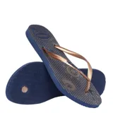 Sandalias Havaianas Slim Nautical con base azul marino con estampado de motivos náuticos en dorado y tiras finas doradas.