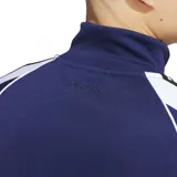 Campera Adidas Tyshawn azul con detalles en blanco y las tres rayas características de la marca en las mangas.