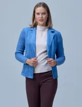 Chaqueta combinada en suede y tejido, con cuello solapa y abertura central, de la marca Sioni.
