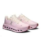 Championes urbanos rosas con detalles en blanco y logo de la marca en gris.