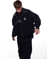 Bomber de jean negro, con calce holgado, puños de algodón y cuello de cuero.