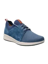 Zapatillas urbanas Hush Puppies modelo Spinal Knit, color azul, confeccionadas en cuero certificado y tejido adaptable.