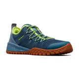 Championes Columbia Fairbanks Low, color azul con detalles en verde flúor y suela marrón.