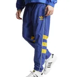Pantalón Adidas de Boca Juniors, inspirado en la colección de 1993. Color azul con detalles en amarillo, escudo del club tejido y logo de Adidas.