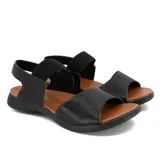 Sandalias bajas negras con elástico en el tobillo y capellada de cuero.