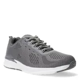 Championes grises con cordones y suela blanca.