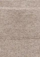 Falda midi color beige de punto acanalado, de corte recto y cintura elástica.