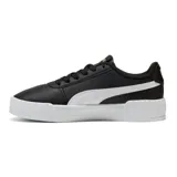 Championes Puma Carina 3.0, color negro con franja blanca en el lateral y suela blanca.