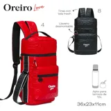Mochila negra con diseño acolchado de corazones, marca Las Oreiro. Tiene correas ajustables para los hombros y una correa lateral.