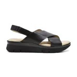 Sandalias negras de cuero con plataforma, tiras cruzadas y tira trasera con ajuste elástico.