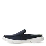 Mocasines Democrata YUGUI descalzo atrás, color azul jean, con suela blanca y plantilla verde flúor.