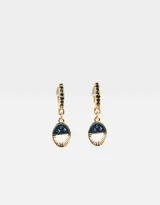 Aros argollas doradas con strass y charm colgante con diseño de sol y luna.