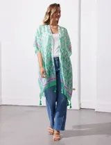 Kimono tejido color naranja con estampado abstracto en blanco y celeste, con terminación de ruedo con borlas.