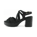 Sandalias negras con plataforma delantera de 2 cm y taco cuadrado de 7 cm. Diseño con tiras cruzadas en el empeine y pulsera con hebilla al tobillo.