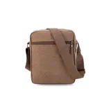 Morral bandolera negro de tela canvas con correa regulable. Tiene apertura superior con cierre, bolsillo frontal con cierre, bolsillos internos y bolsillo trasero con cierre.