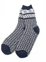 Medias de lana en tonos azul y blanco, con diseño divertido de estrellas.
