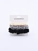 Pack de tres coleros para el pelo, uno color crema, uno con estampado dálmata y uno negro.