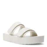 Sandalias de plataforma blancas con dos tiras anchas con ajuste de velcro.
