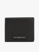Billetera plegable Tommy Hilfiger de cuero granulado color negro, con logo metálico en la parte delantera y monogramas TH en relieve en el interior. Cuenta con múltiples ranuras interiores para tarjetas.