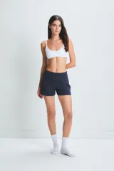 Short azul de morley pesado con cintura elastizada y cartera falsa con botones.
