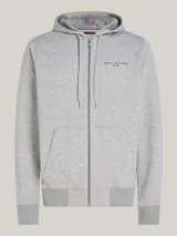 Buzo gris con capucha Tommy Hilfiger, con cierre de cremallera, bolsillos tipo canguro, forro de piel sintética y logo bordado en el pecho.