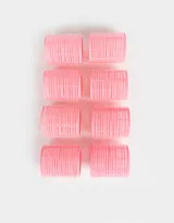 Set de ocho ruleros rosados con superficie de velcro para sujetar el pelo.