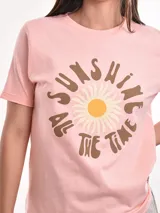 Remera blanca de algodón con estampado de limones y texto en azul.