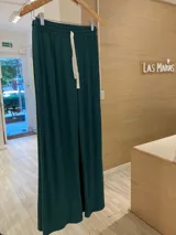 Pantalón palazzo color ladrillo, de morley de viscosa, con cintura elastizada y cordón blanco ajustable.