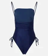 Malla enteriza azul marino con escote cuadrado, breteles finos y detalle de fruncido con lazos en los laterales.