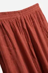 Pantalón palazzo verde esmeralda de viscosa, con cintura elástica.