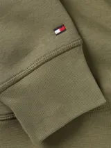 Buzo verde militar de Tommy Hilfiger con capucha ajustable con cordones y bolsillo tipo canguro. Estampado frontal con el logo de la marca y la inscripción 'New York Est. 1985'.