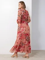 Vestido maxi de gasa estampada con escote en V, lazo de ajuste y manga larga con puños elásticos.