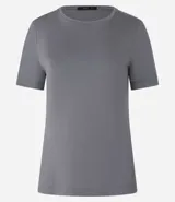 Blusa básica de viscosa color rosa, con cuello redondo y mangas cortas.