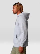 Buzo canguro gris melange con capucha y bolsillo canguro frontal. Estampado frontal con el logo de Mountain Hardwear en negro.