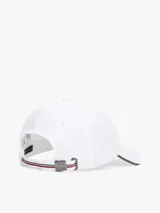 Gorra de béisbol blanca con visera curva y detalle de borde gris.