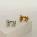 Anillo plateado con forma de concha marina y estrella de mar, de acero quirúrgico hipoalergénico.