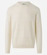 Buzo de hombre con cuello redondo, corte comfort, manga larga con puños ajustados y tejido texturizado.