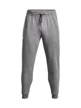 Pantalón de jogging Under Armour Rival Fleece para hombre, color gris melange, con cintura elástica ajustable, bolsillos laterales y logo bordado en la pierna izquierda. Corte ajustado en los tobillos.